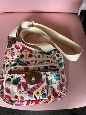 Vintage Lily Bloom Floral Canvas Crossbody in Cream, Pink, Blue and Yellow.